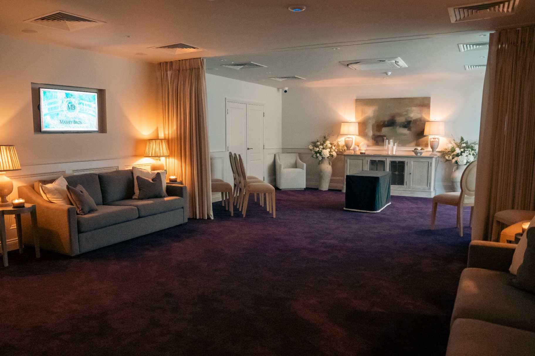 A warm, welcoming lounge inside a Massey Bros. funeral home